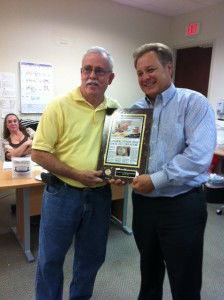Hansen presents 14K Gold Charm plaque to Borrego